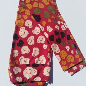 Red background Lularoe OS leggings